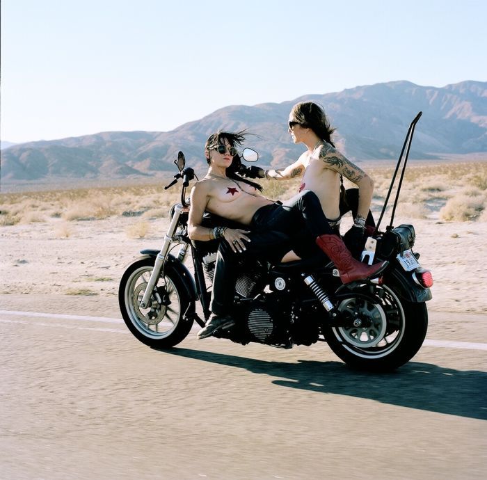 Girls on a motorcycle in Fuqin