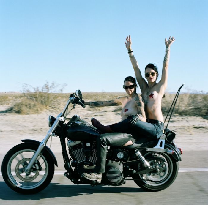 Girls on a motorcycle in Fuqin